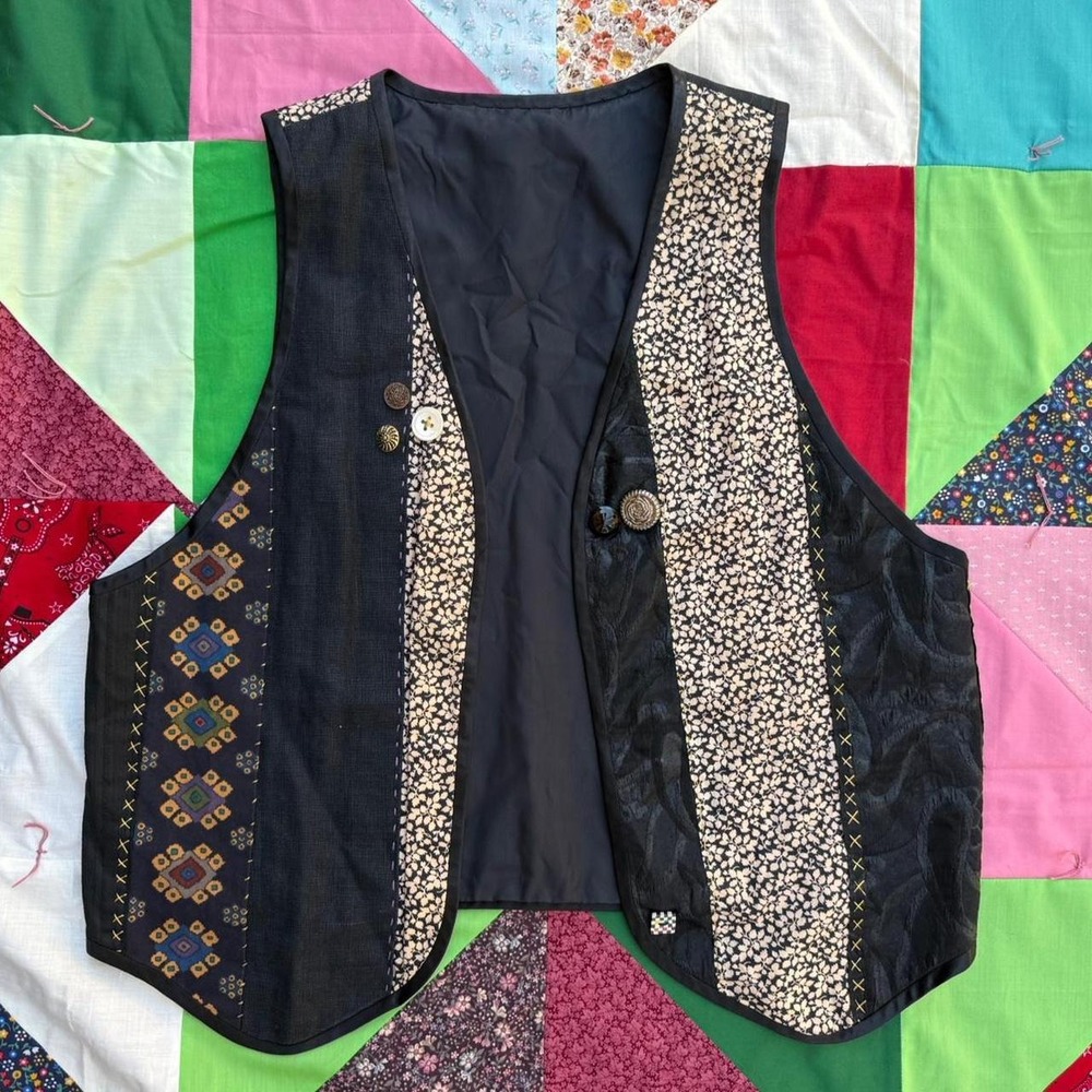 Handmade colorful patchwork vest with button appliqué